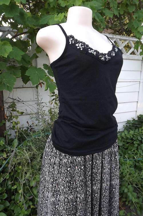 Black Strappy Top with Embellishment on Front by Real Clothing in size 12/34 - good used condition
