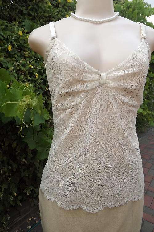 Cream Vera Moda U.S.A. Lace and satin strappy top in size 34/10 with embellished front.As new