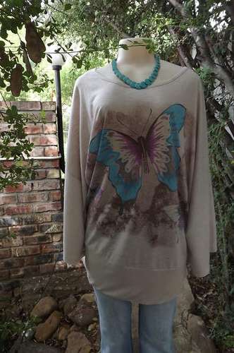 Stunning beige top with large colourful butterfly by Donna Claire in size 46/22.Very good condition