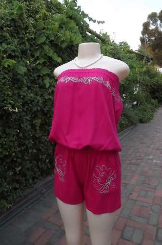 Dark pink Jumpsuit with embroidery on strapless top and short pockets from Audacity.Size 35/11.Used