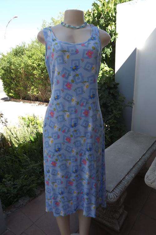 Maxi summer dress in cheerful blue floral pattern.Size 36/12 by Insync U.S.A.Good used condition
