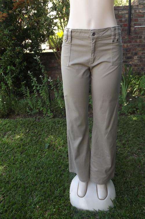 Beige ladies stretch cotton pants by Foschini.Size 40/16.2 Pockets on front and 2 on back.Good used