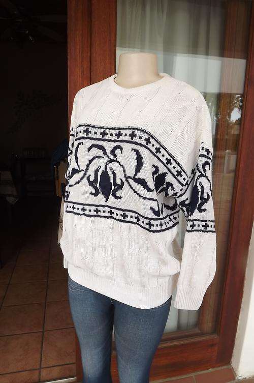 White cotton/viscose knit mens sweater in cable knit with navy pattern.size medium.Crew neck.Beautif