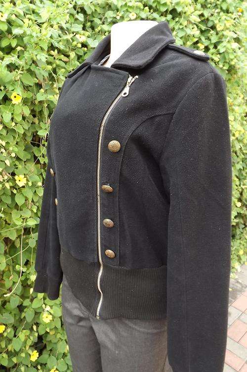Black heavy brushed polyester lined jacket with zip-up front in size 40-42.Wide knitted ribbing and