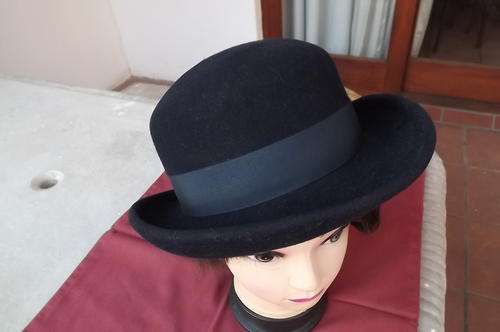 Black felt hat with medium brim and round top by S.A Cap manufactures Cape Town.As new 57