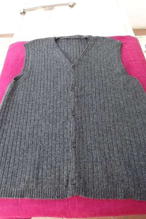 Men's grey acrylic waistcoat knitted in ribstitch.Chest 120cm Size large.Button down front.Good con