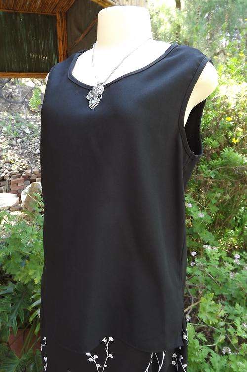Black Bee-Bop vest type cami in size 40/16.In 100% wash&wear polyester.As new