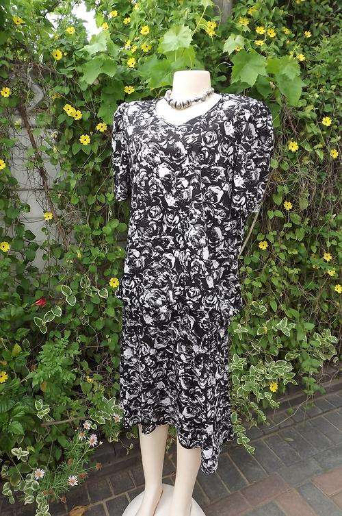 Silky polyester monochrome drop waist vintage dress.Size 44/20.Band over hips with flair skirt.