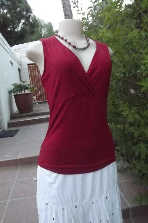 Dark red stretch viscose top with V crossover top. Size 36/12 by Woolworths. As new condition.