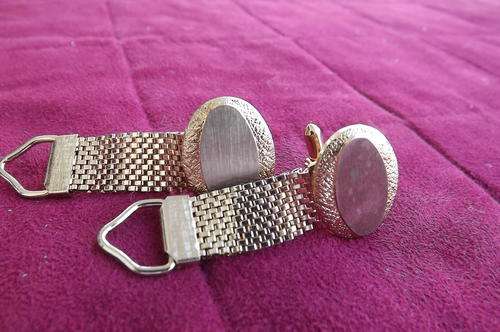 Pair of good quality gold toned Men's cufflinks in oval shape. As new condition.