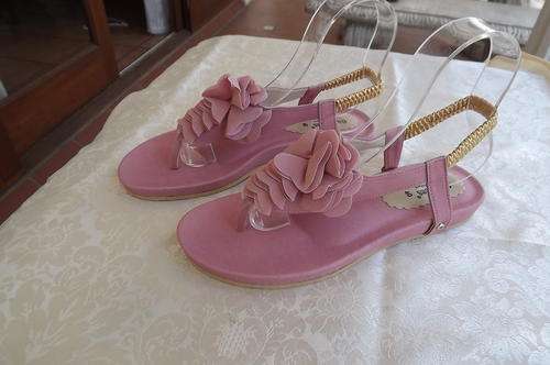 Pair of beautiful pink sandles in size 6.5/40 by On  Shoes.New- never used.Soft insides.