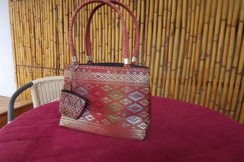 Stunning handbag for evening or day wear. Jacqaurd fabric.22cm by 16cm. Stand alone.