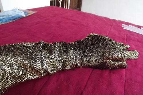 Pair of long black and gold lurex gloves by Chic in size 8.5.As new