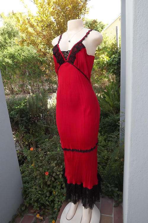 Silky red retro long creased body hugging dress with black lace decoration.Size 34/10