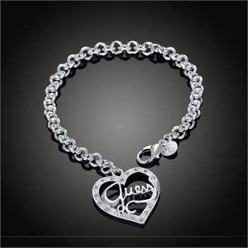 Silver guess  bracelet and pendant .. low  shipping special