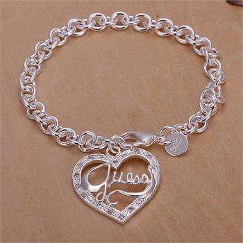 Silver guess  bracelet and pendant .. low  shipping special