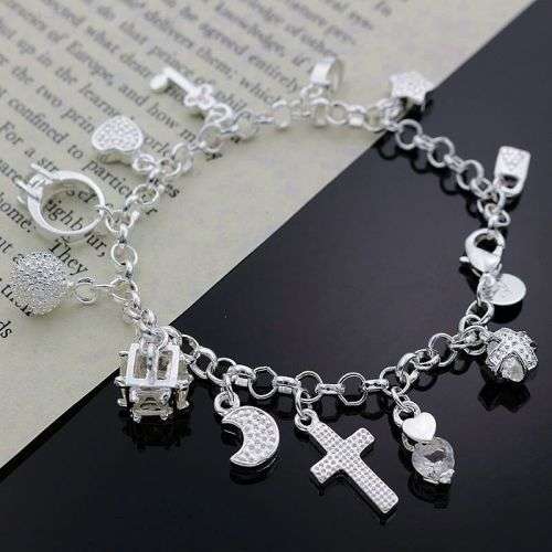 Silver whimsical charm bracelet  .. low WEEKEND shipping special