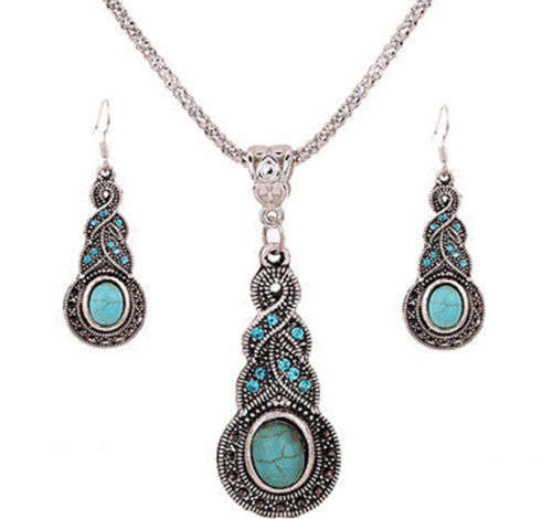Tibetan silver pendant, earring and necklace set  .