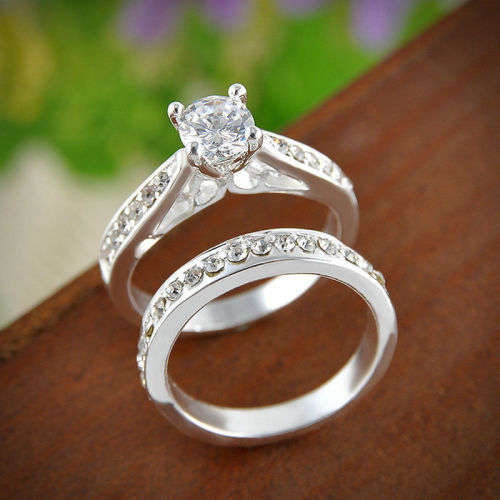Set of 2 wedding rings- CZ and silver filled.
