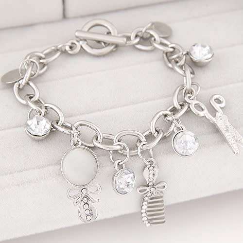 Silver filled whimsical charm bracelet..