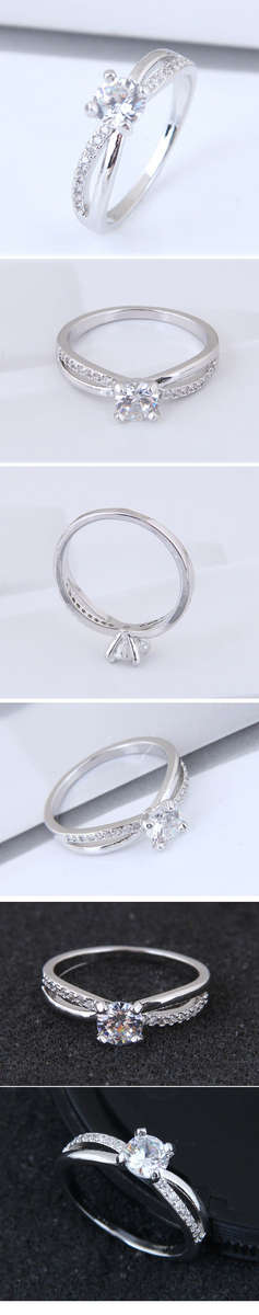 Solitaire CZ wrapped in white gold filled setting..with swarovski elements