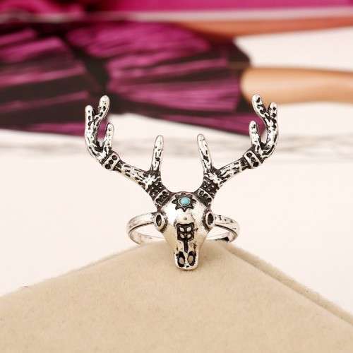 Retro/hippie Steers head turquoise bronze ring