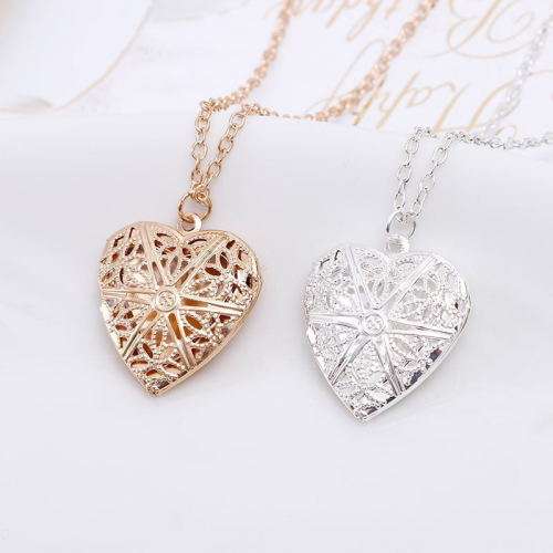 Filigree heart locket. and free chain. LOWEST SHIPPING