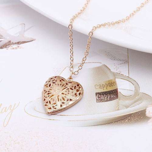 Filigree heart locket. and free chain. LOWEST SHIPPING