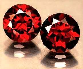 GARNETS 2 X  NATURAL MINED MOZAMBIQUE. 4.00mm x 3.00mm EACH. 0.39 ct EACH. IDEAL FOR SETTING!!