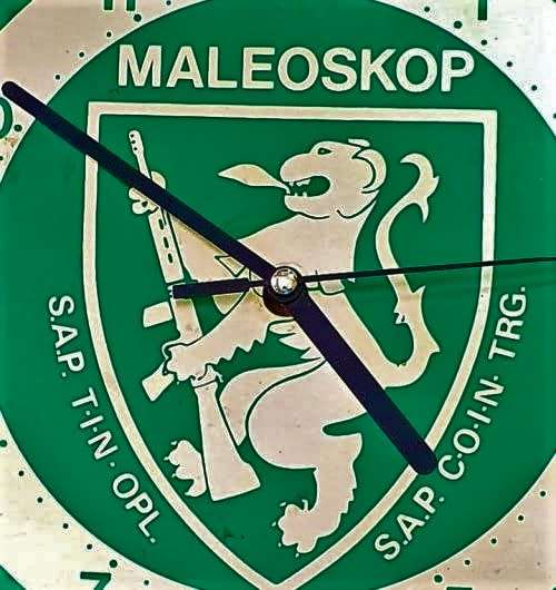 MALEOSKOP 1984. SAP TIN OPL / SAP COIN TRG.  WALL MOUNTED CLOCK. 30CM X 30CM .