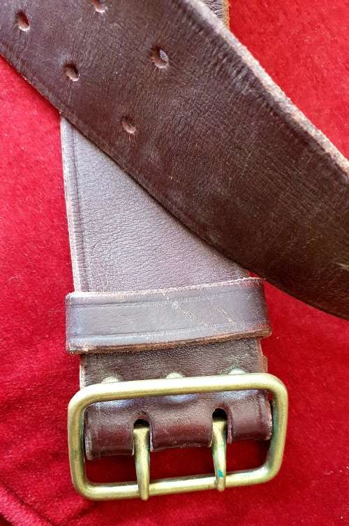 1978 POLICE ISSUED LEATHER BELT WITH BRASS BUCKLE.