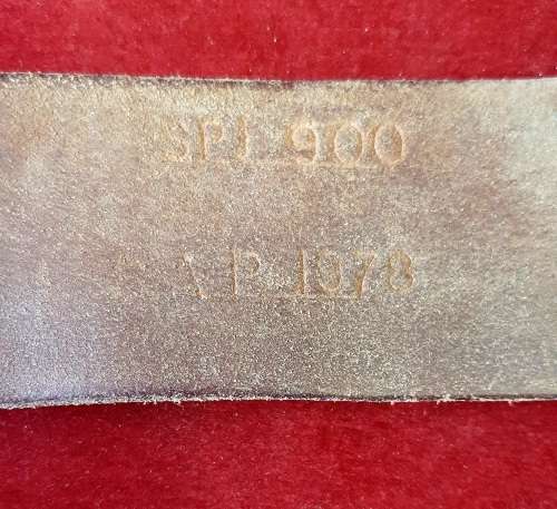 1978 POLICE ISSUED LEATHER BELT WITH BRASS BUCKLE.