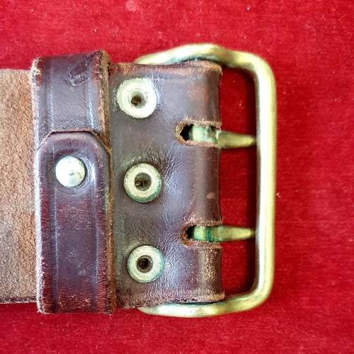 1978 POLICE ISSUED LEATHER BELT WITH BRASS BUCKLE.