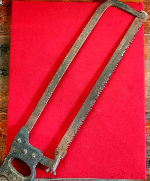ANTIQUE HUGE BUTCHERS SAW. 70CM LONG.