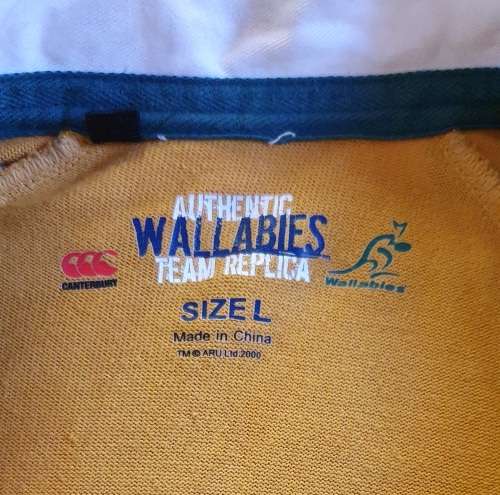 AUTHENTIC WALLABIES TEAM REPLICA JERSEY. SIGNED BY GEORGE GREGAN. L. 2000