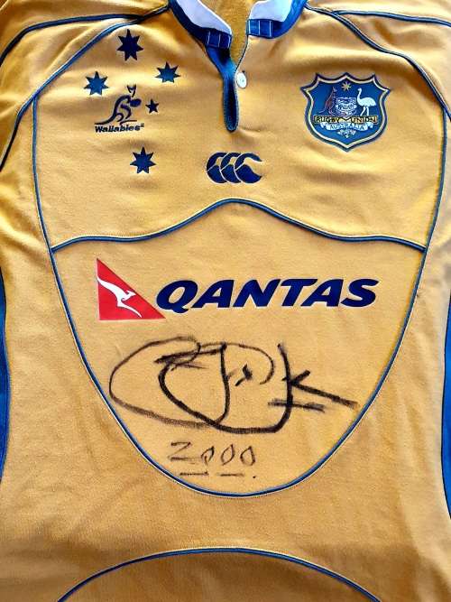 AUTHENTIC WALLABIES TEAM REPLICA JERSEY. SIGNED BY JONAH LOMU. XL. 2000