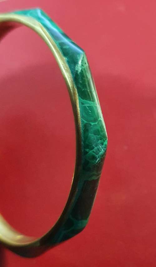 VINTAGE MALACHITE STONE AND HEAVY BRASS BANGLE.