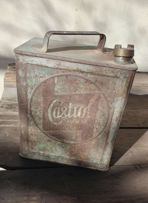 ANTIQUE EMBOSSED CASTROL MOTOR OIL 2 GALLON CAN. ORIGINAL BRASS LID.