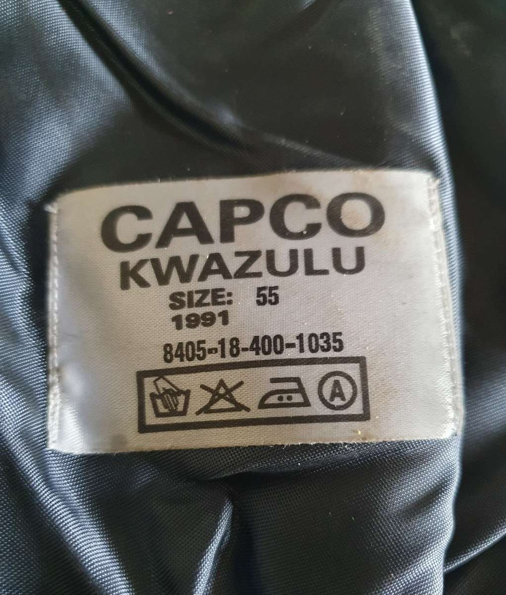 1991 BLACK BERET. SIZE 55. UNWORN. LEATHER  RIBBING.