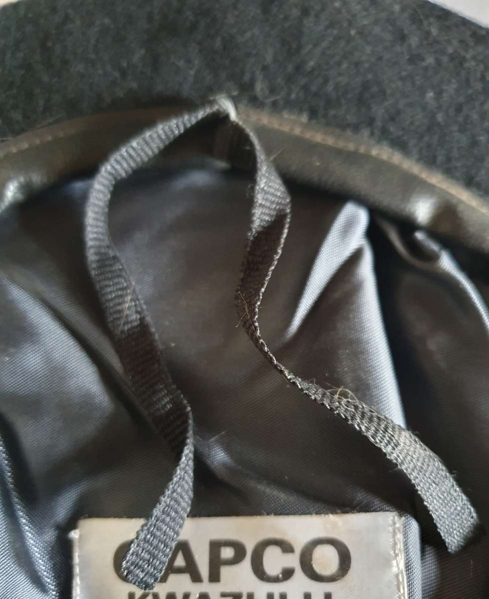 1991 BLACK BERET. SIZE 55. UNWORN. LEATHER  RIBBING.