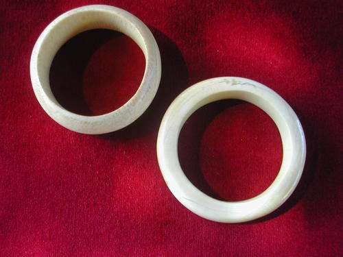 TWO IVORY BANGLES. HAND MADE. NAMIBIA. RARE FIND!!