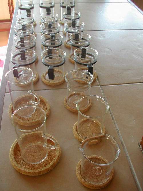 COMPLETE BODUM SET WITH COASTERS!! 66 PCS. NEVER BEEN USED!!!