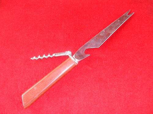VINTAGE CHEESE CUTTER WITH CORK SCREW AND BOTTLE OPENER. 3 IN 1 !