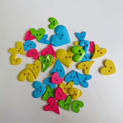 Lot of 29 heart shape and bright colour buttons