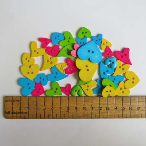 Lot of 29 heart shape and bright colour buttons
