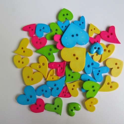 Lot of 29 heart shape and bright colour buttons
