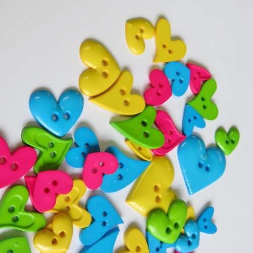 Lot of 29 heart shape and bright colour buttons