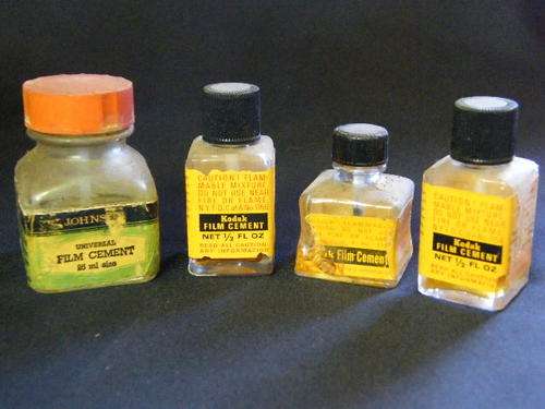 Lot of 4 vintage film cement bottles with some fluid