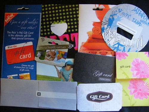 10 Unissued Gift cards or packets - you bid per item to take all - no values loaded - for collectors