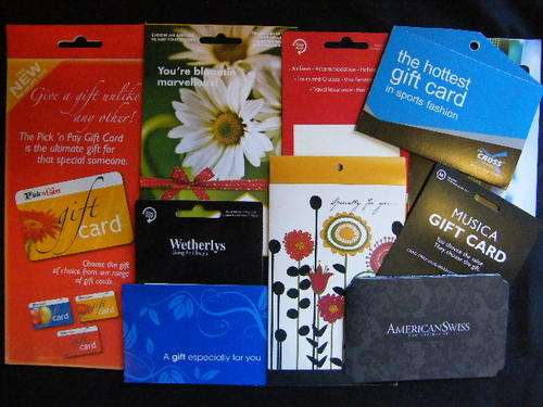 10 Unissued Gift cards or packets - you bid per item to take all - no values loaded - for collectors